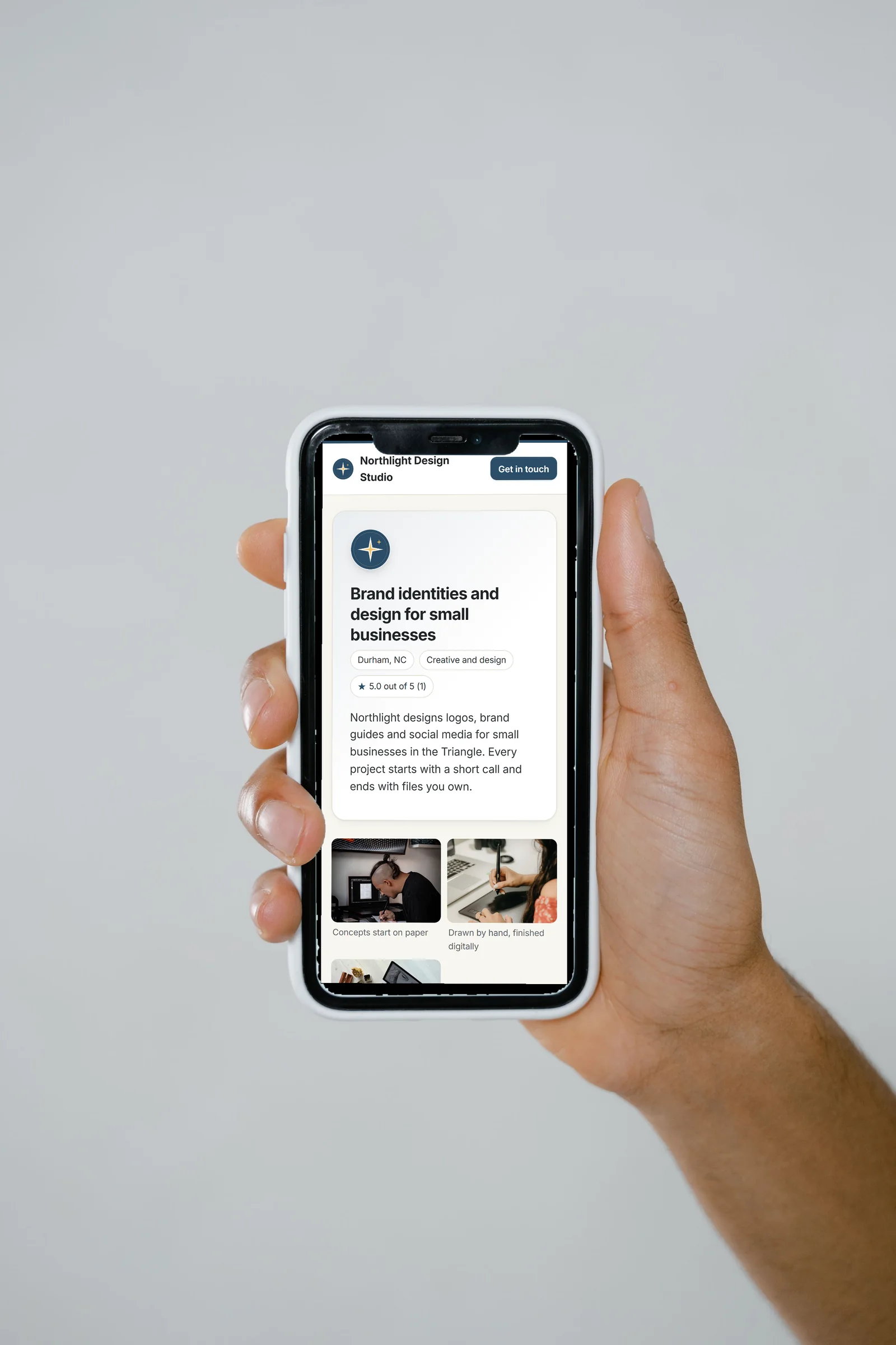 A design studio's Fountain page open on a phone